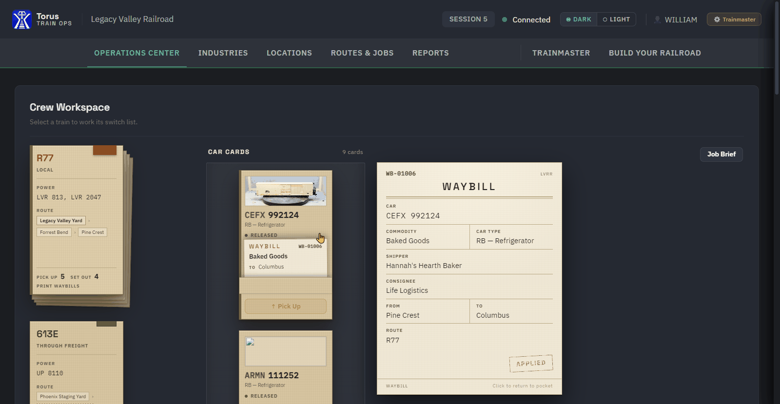 The crew workspace showing car cards and a waybill for a refrigerator car of baked goods